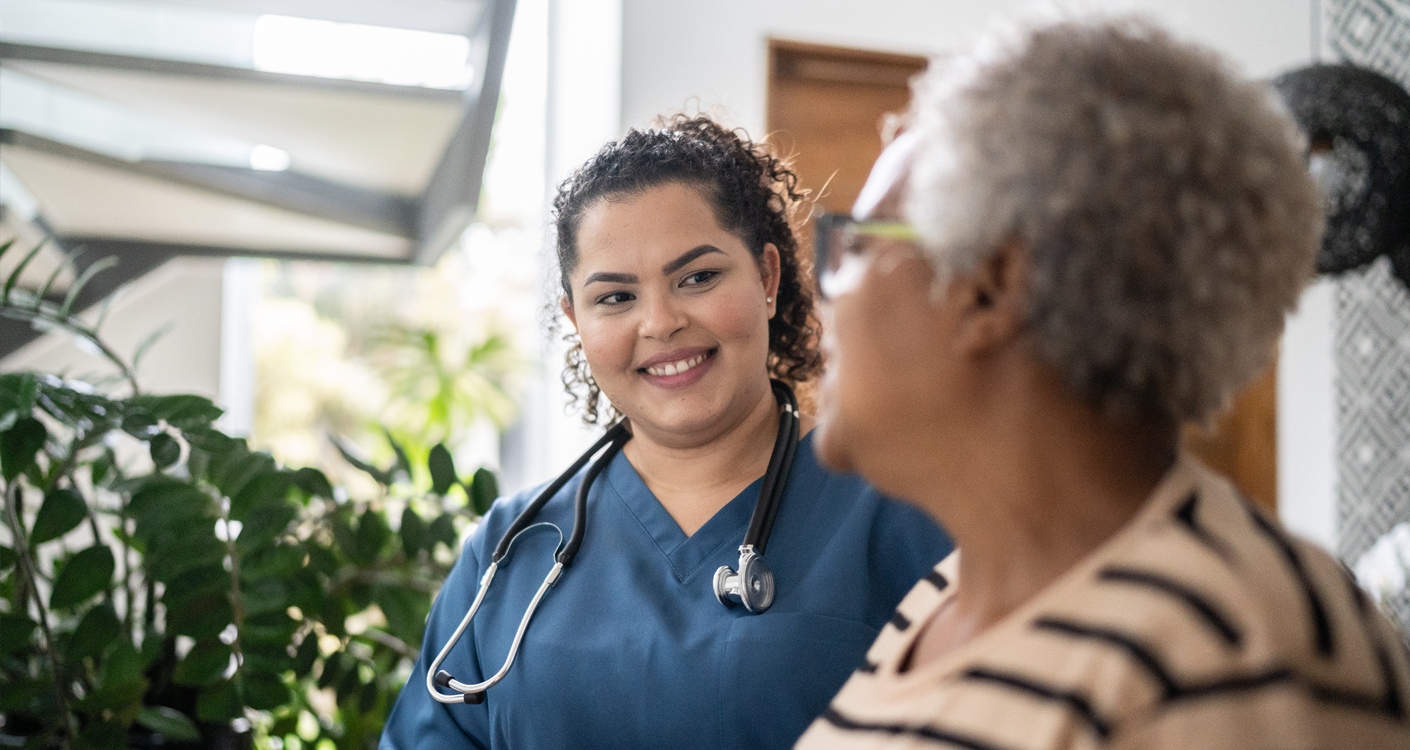 Nurse with elderly patient