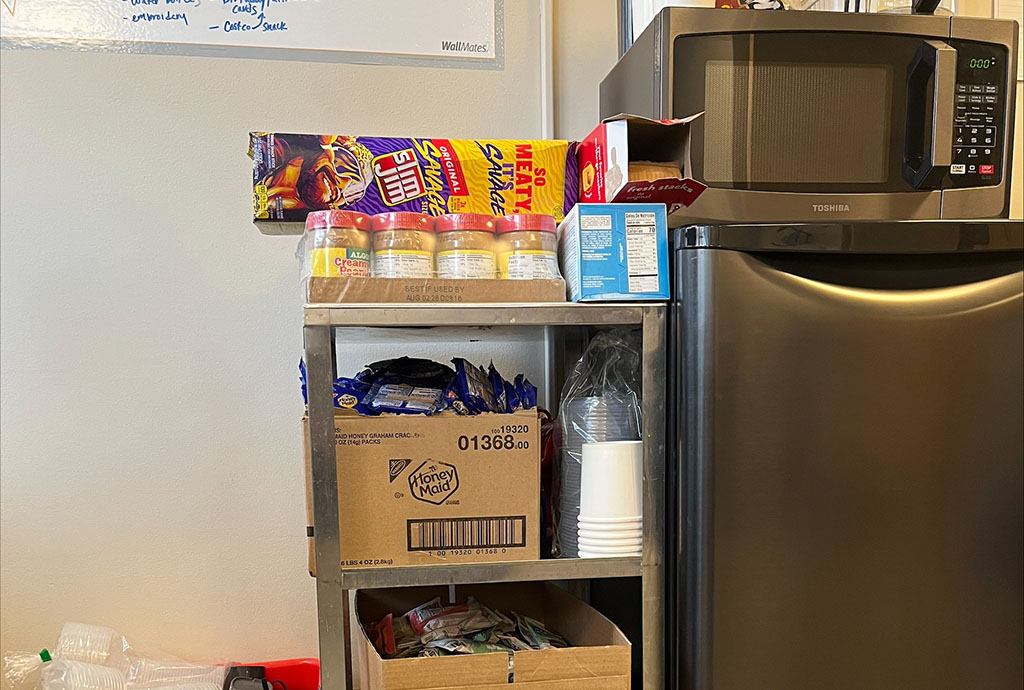 cart and refrigerator with snacks