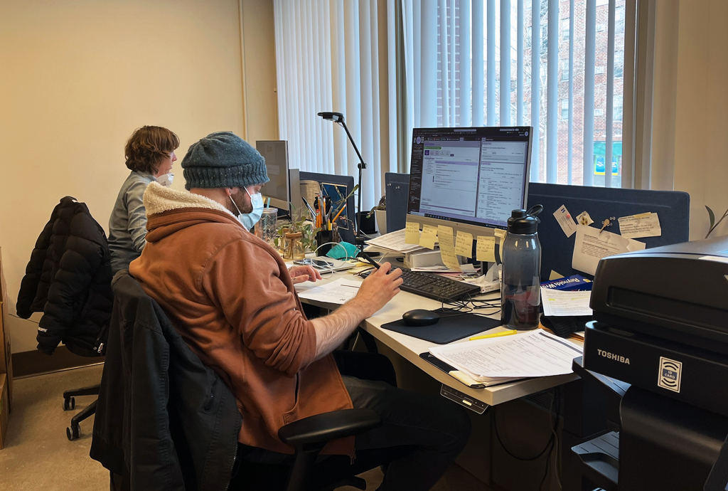 Endeavors staff work at computers