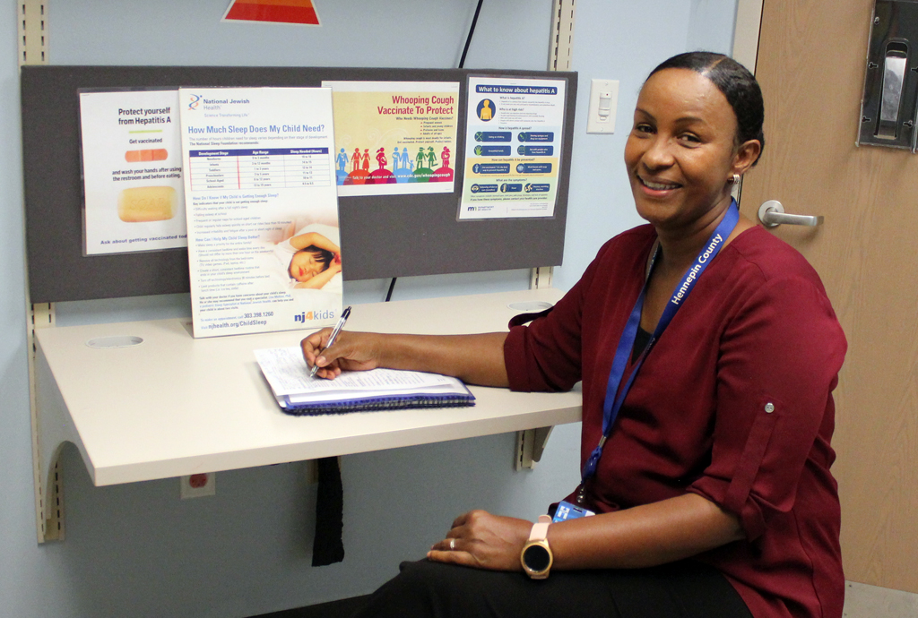 Naomy, a mental health practitioner, in her office