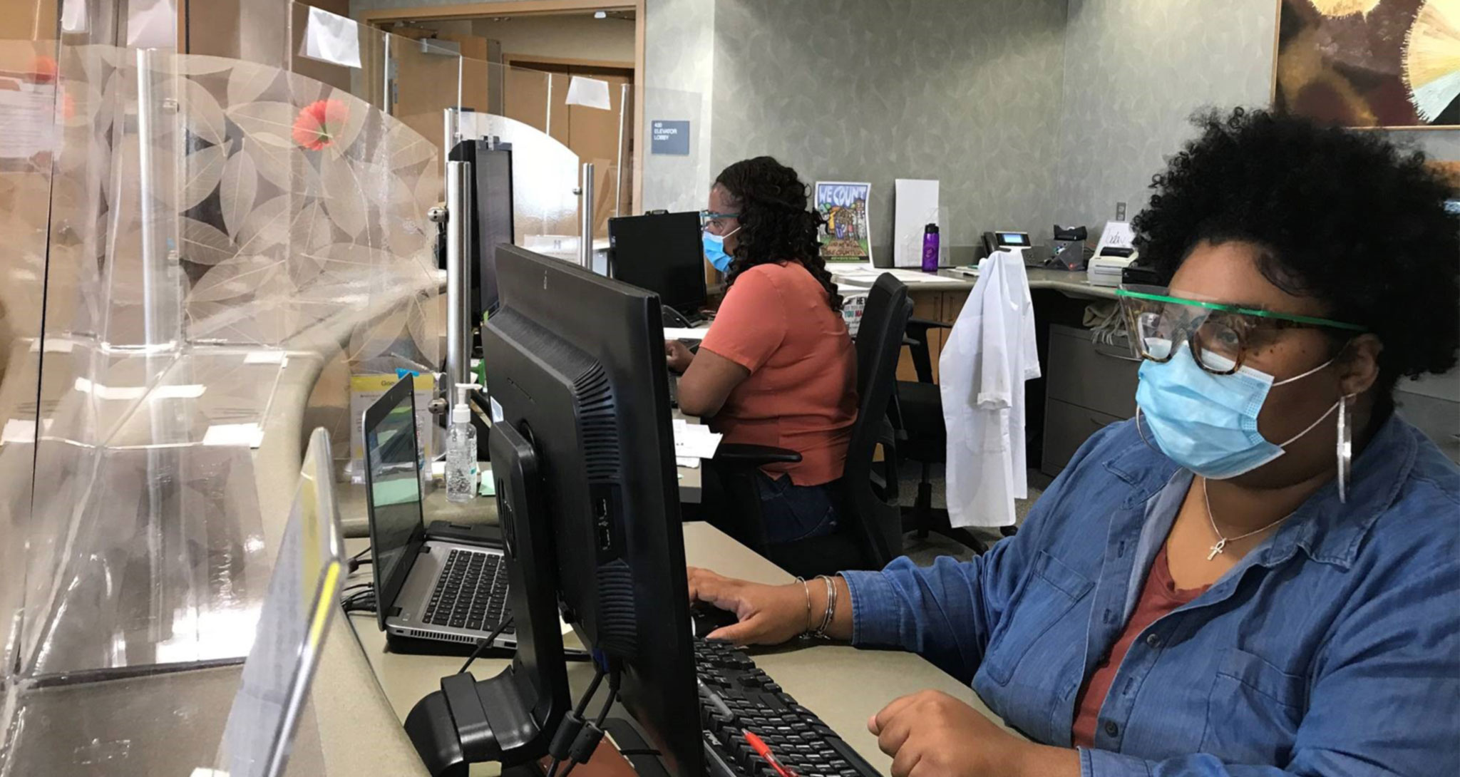 Staff wearing facemasks at the Public Health Clinic