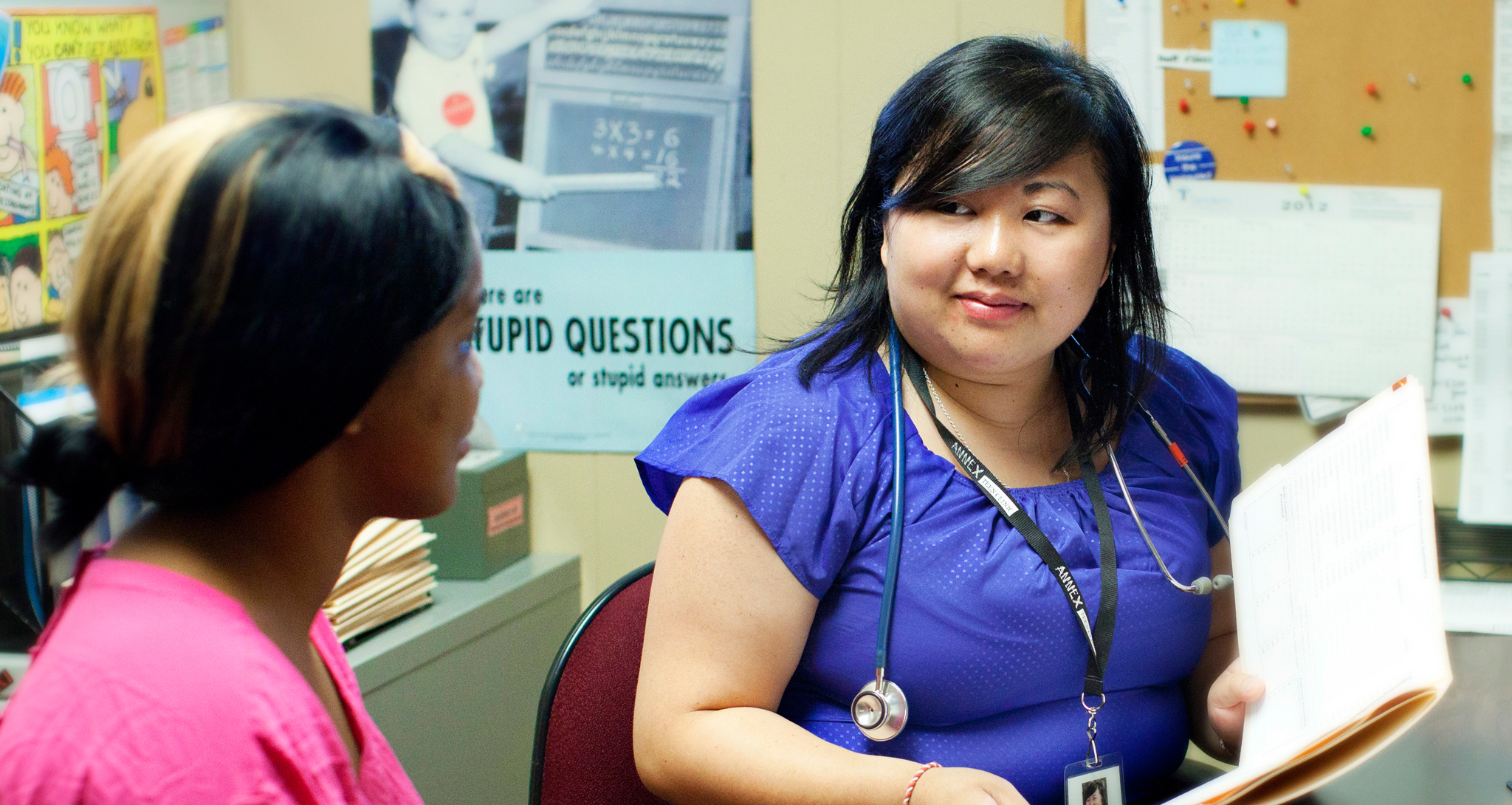 Youth and nurse talking