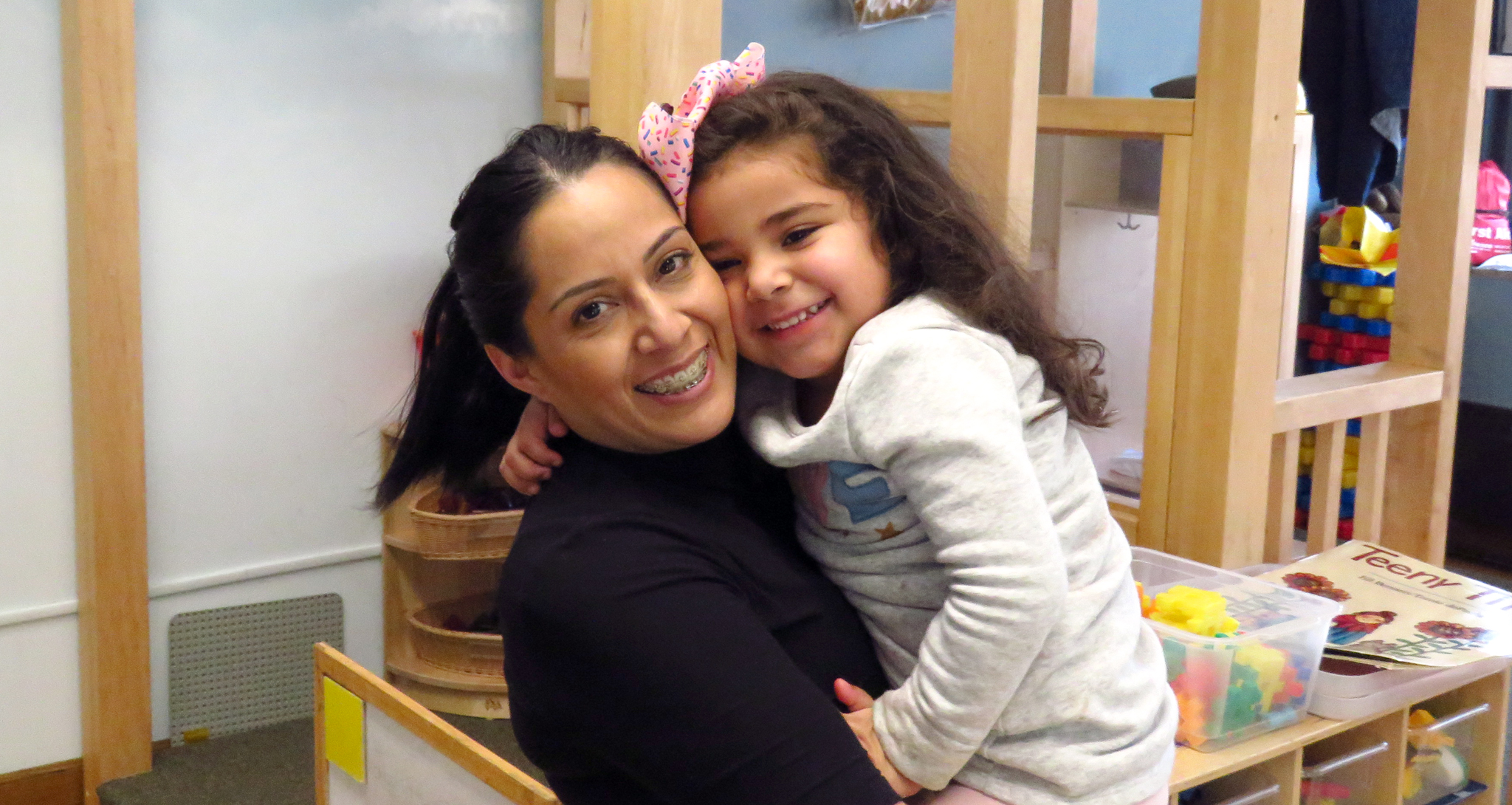 Elsy and her daughter Sophia hugging