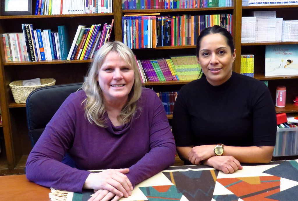 Debbie, Baby Space director, sitting with a parent