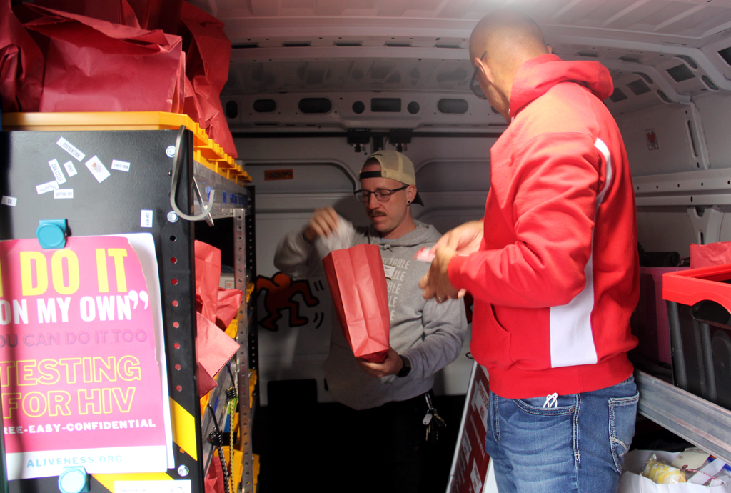 Aliveness Project staff inside the mobile van