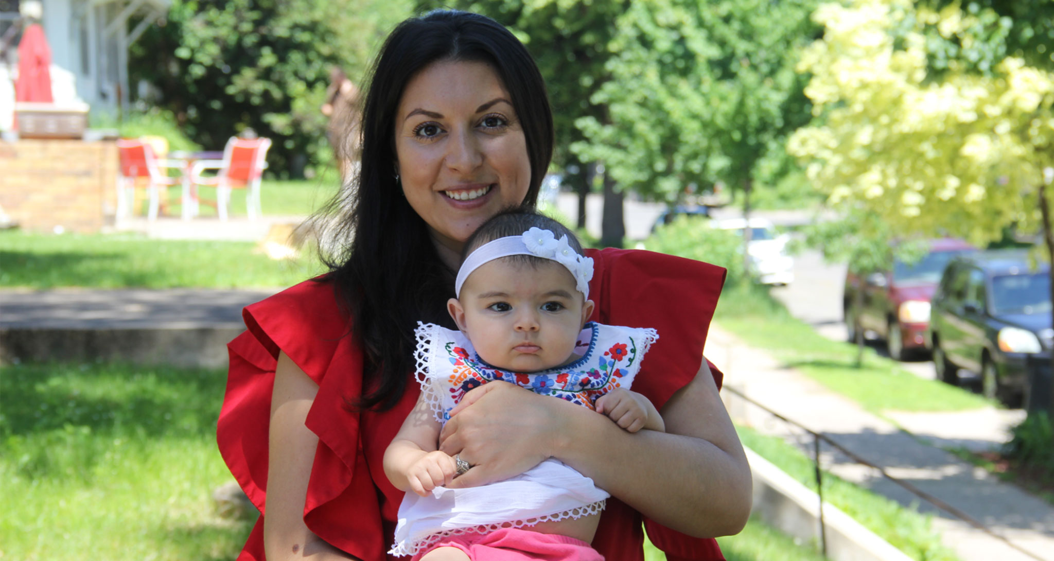 Avra holding her daughter